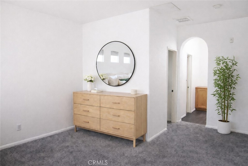 1285 Fools Gold Way, Unit 2 Chula Vista, CA 91913 - Photo 31 of 43 an entryway with a mirror and a sink