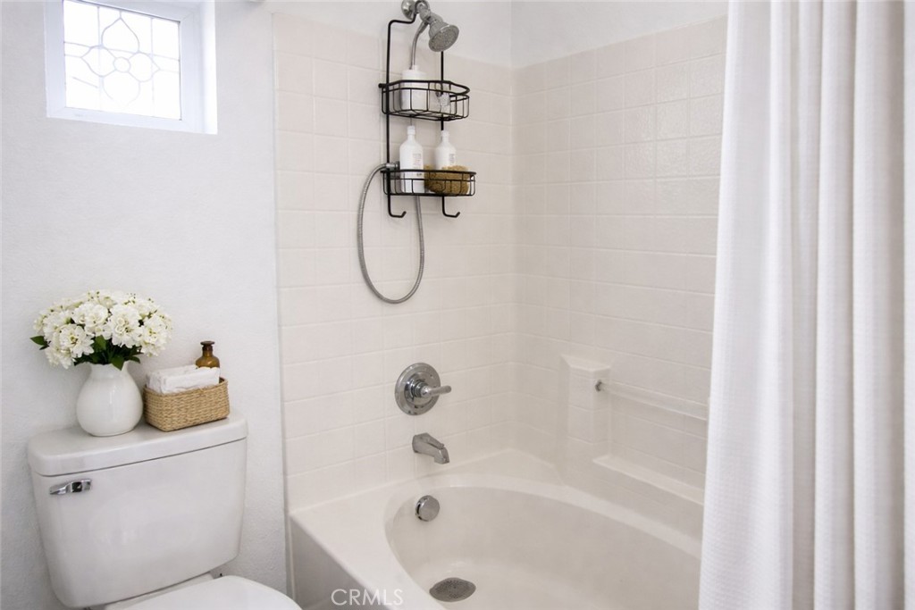 1285 Fools Gold Way, Unit 2 Chula Vista, CA 91913 - Photo 37 of 43 a bathroom with a shower and a bathtub