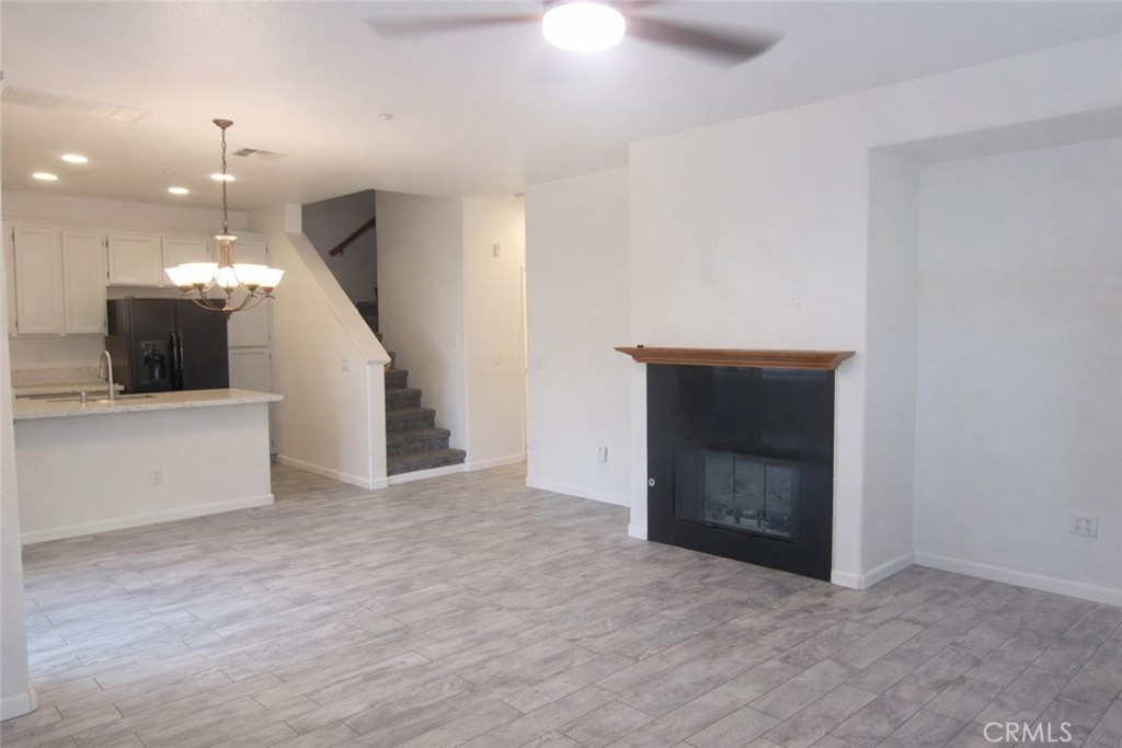 1285 Fools Gold Way, Unit 2 Chula Vista, CA 91913 - Photo 7 of 43 a view of an empty room and a kitchen