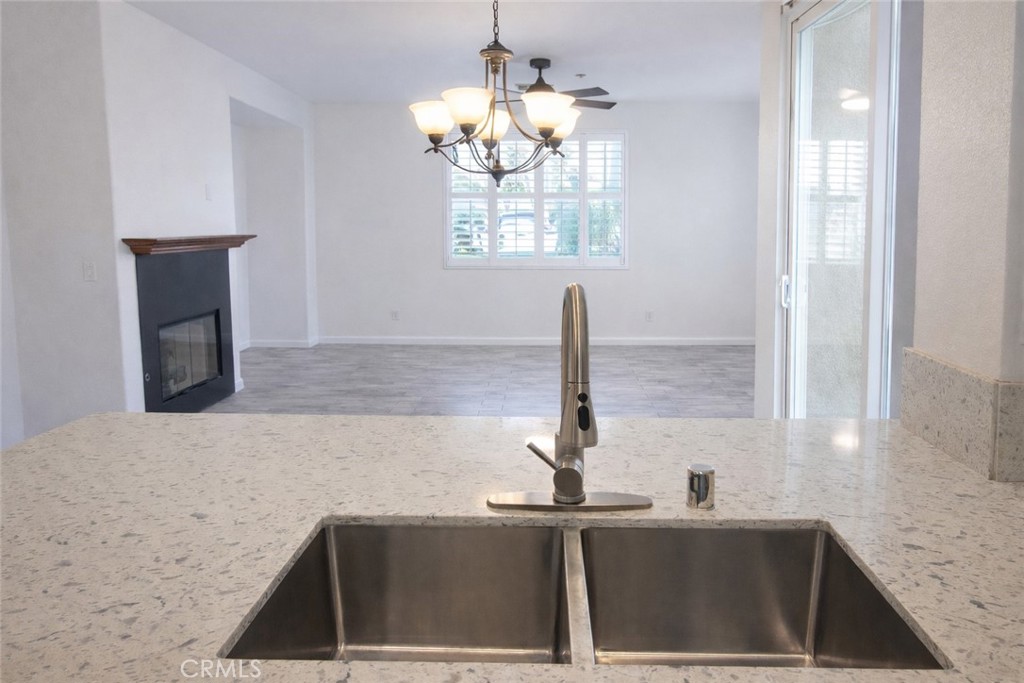 1285 Fools Gold Way, Unit 2 Chula Vista, CA 91913 - Photo 10 of 43 a kitchen with a sink and a window