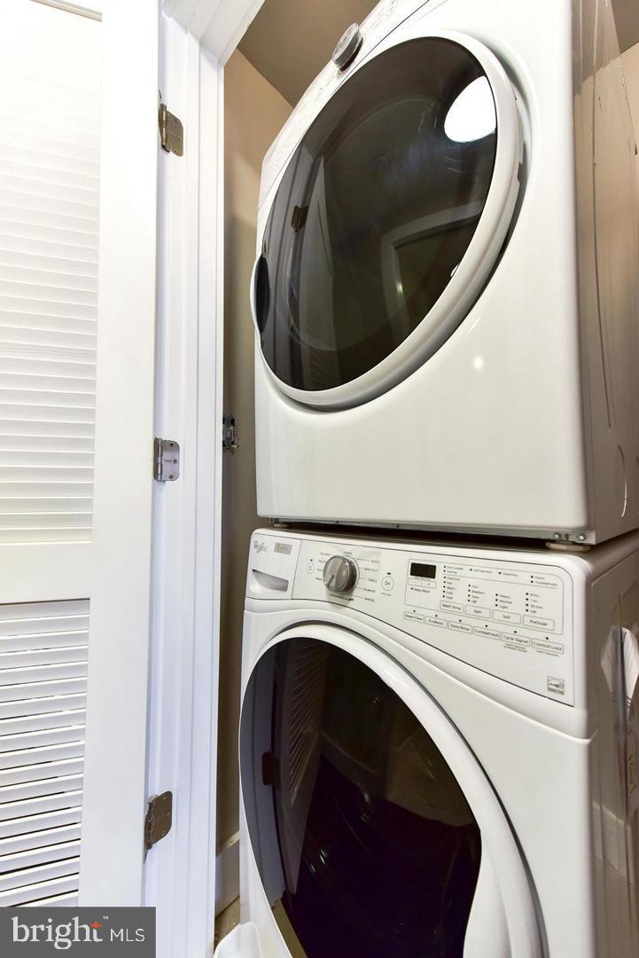 1453 Girard Street Northwest, Unit 3 Washington, DC 20009 - Photo 18 of 21 a utility room with dryer and washer