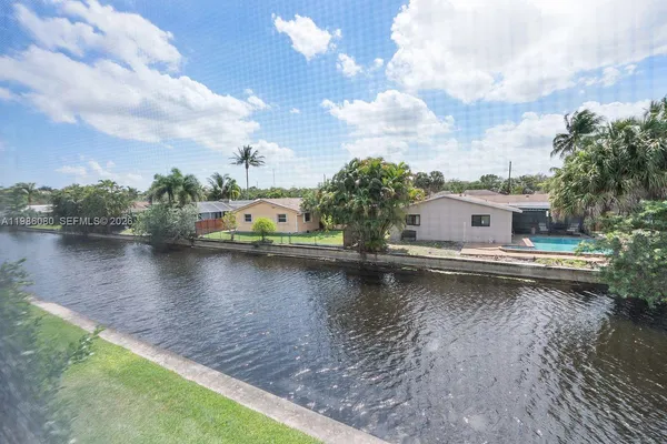 a view of a lake with houses