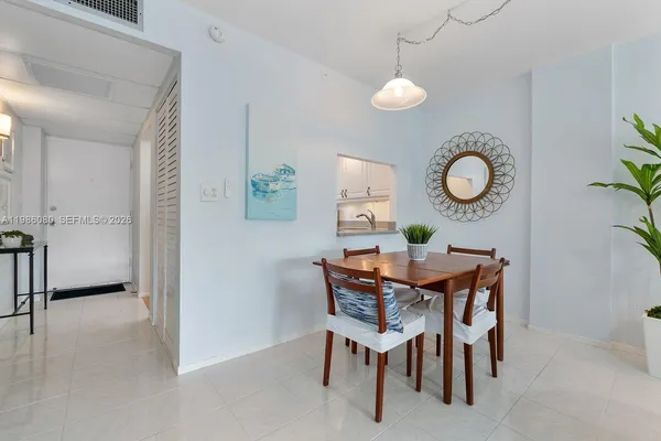 a view of a dining room and chairs