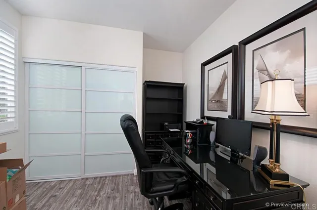 a view of a workspace with furniture