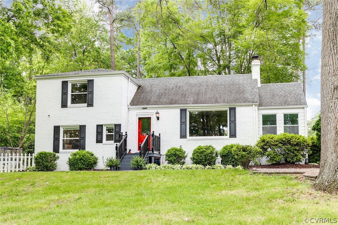 7547 Cherokee Road Richmond, VA 23225 - Photo 1 of 29 front view of a house with a yard