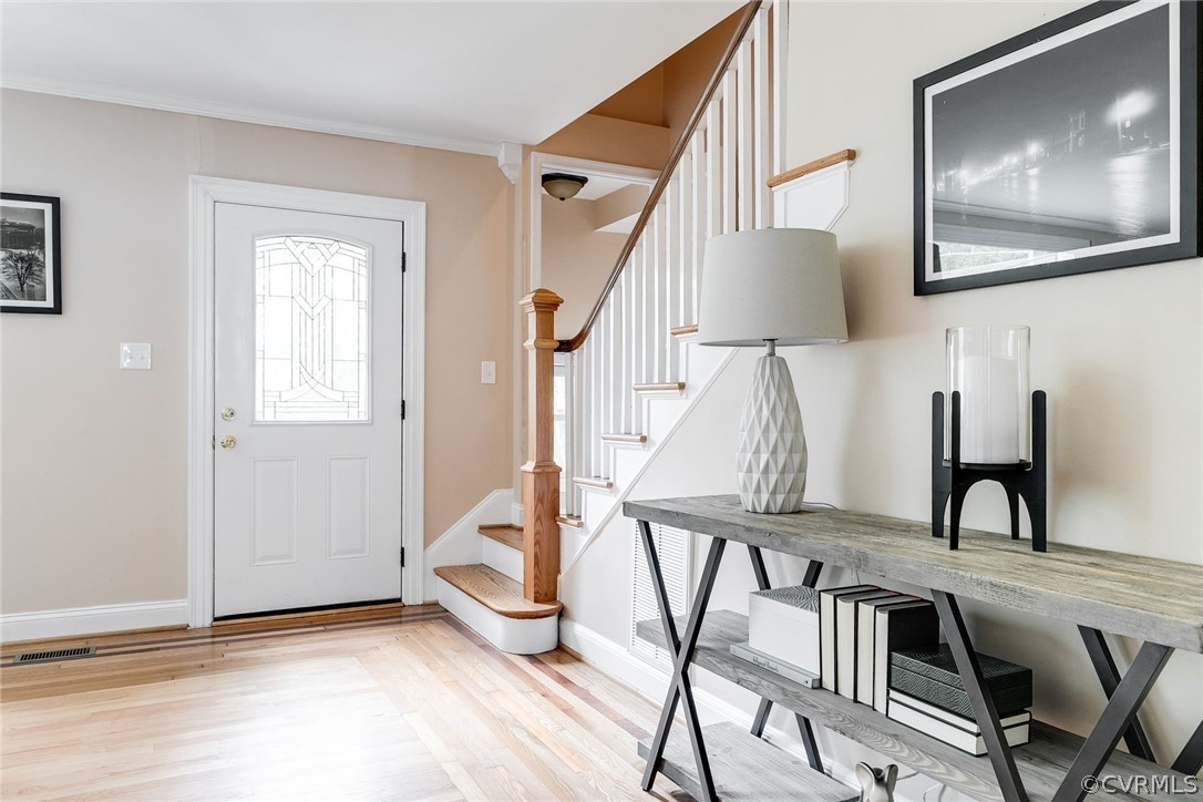 7547 Cherokee Road Richmond, VA 23225 - Photo 4 of 29 a view of a livingroom with furniture and stairs