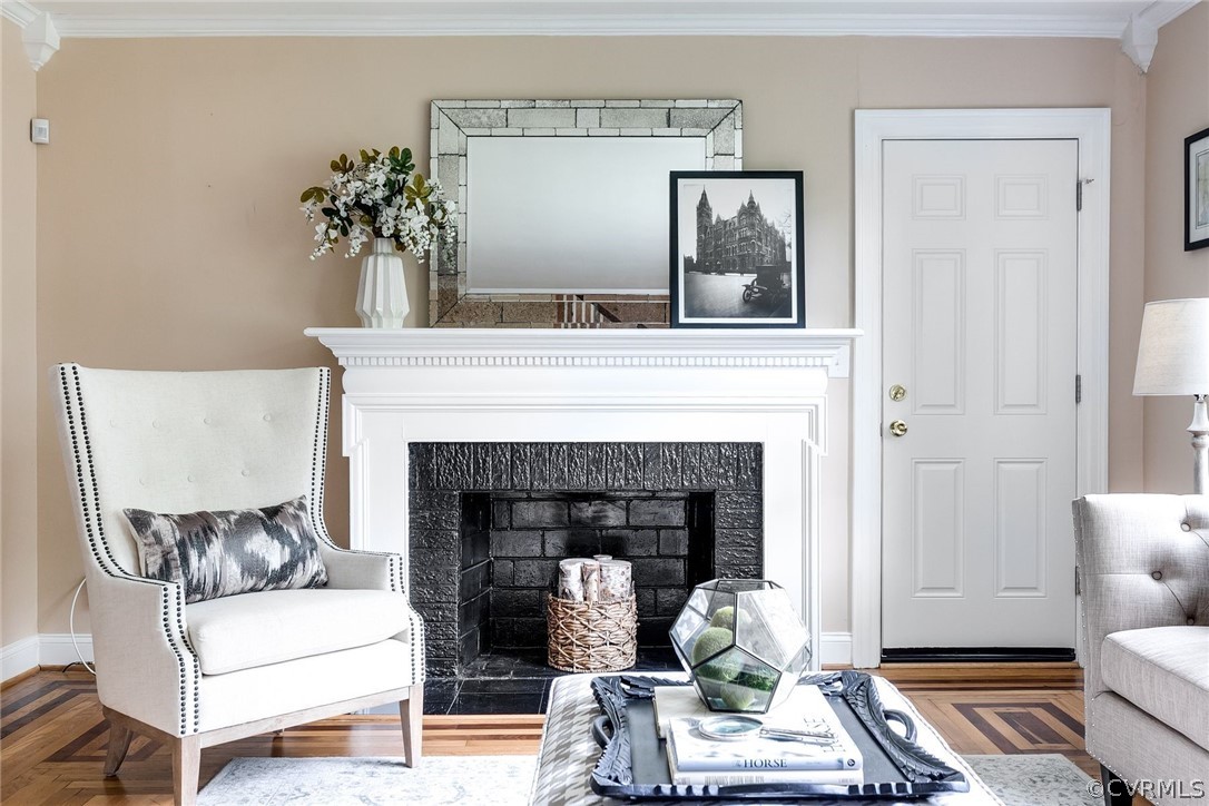 7547 Cherokee Road Richmond, VA 23225 - Photo 6 of 29 a living room with furniture and a fireplace