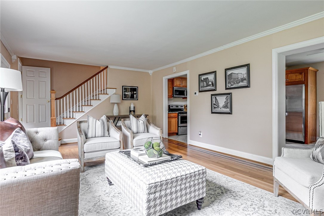7547 Cherokee Road Richmond, VA 23225 - Photo 7 of 29 a living room with furniture and a rug
