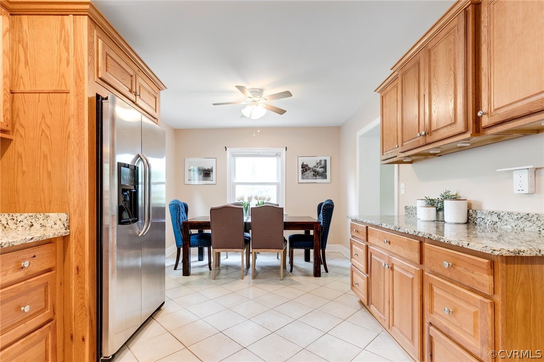 7547 Cherokee Road Richmond, VA 23225 - Photo 10 of 29 a view of dining table chairs and chandelier