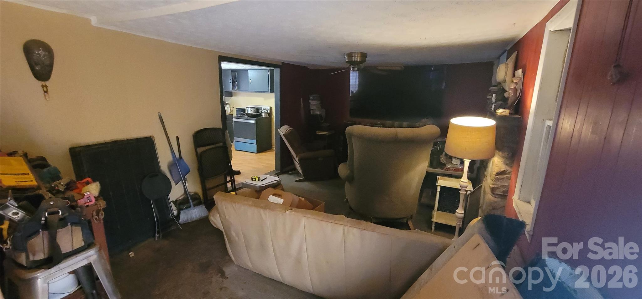 60 Mingus Street Canton, NC 28716 - Photo 7 of 14 a living room with furniture and a flat screen tv