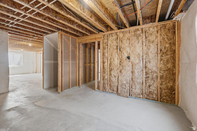 730 West 500 North Smithfield, UT 84335 - Photo 29 of 46 Unfinished basement presenting framed walls, exposed ceiling joists, and concrete flooring
