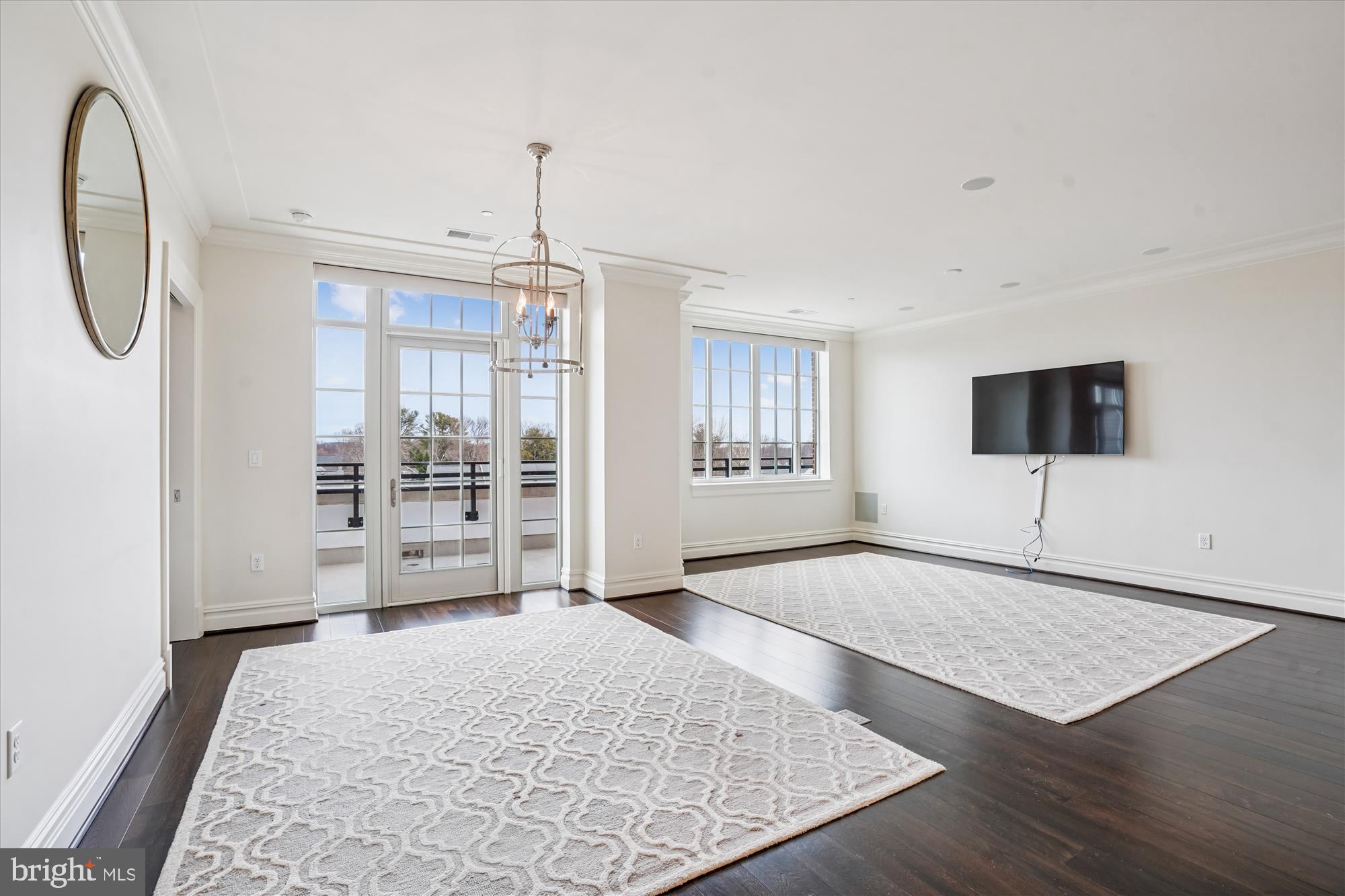 6900 Fleetwood Road, Unit 600 McLean, VA 22101 - Photo 5 of 32 a view of a livingroom with wooden floor and entryway