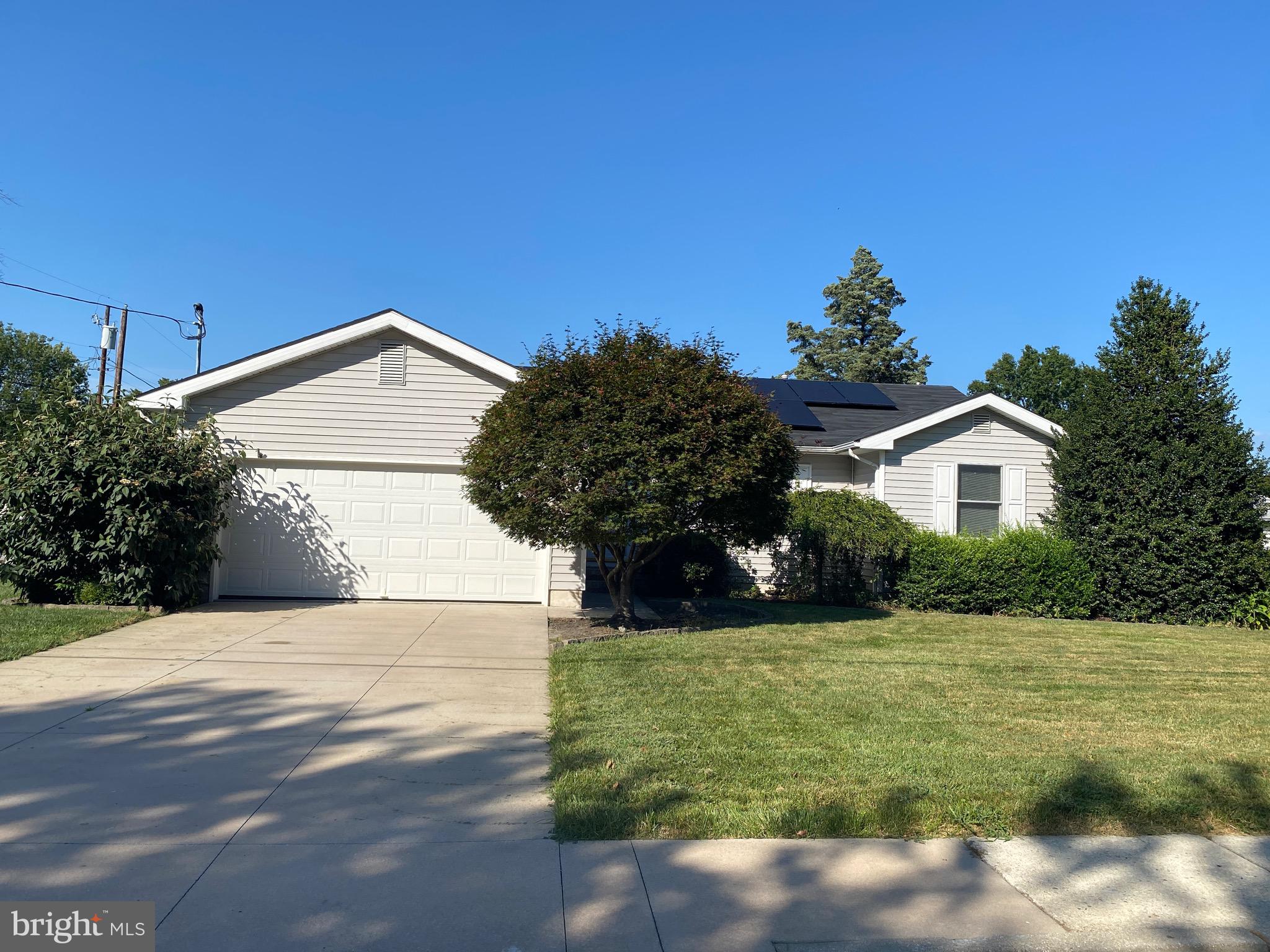 42 Harvard Road Pennsville, NJ 08070 - Photo 2 of 26 a view of a house with yard and tree s