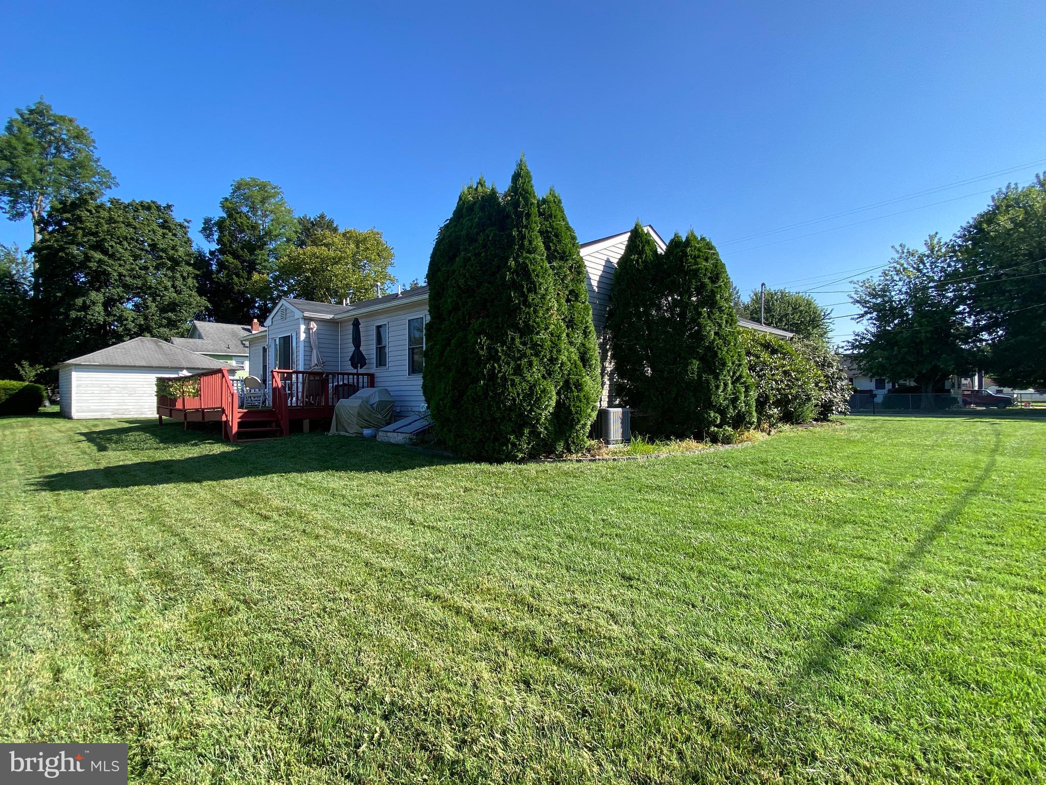 42 Harvard Road Pennsville, NJ 08070 - Photo 8 of 26 a view of a house with a backyard