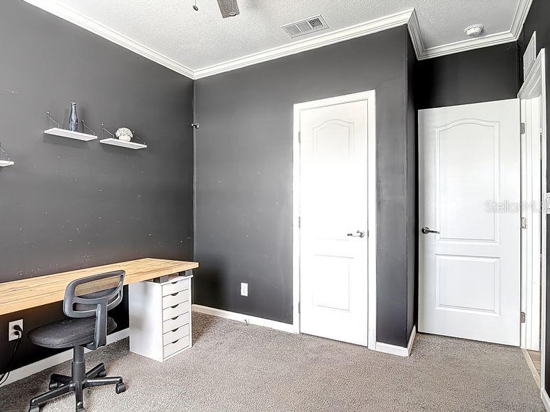 102 Ash Street Edgewater, FL 32141 - Photo 27 of 36 a view of a workspace with furniture