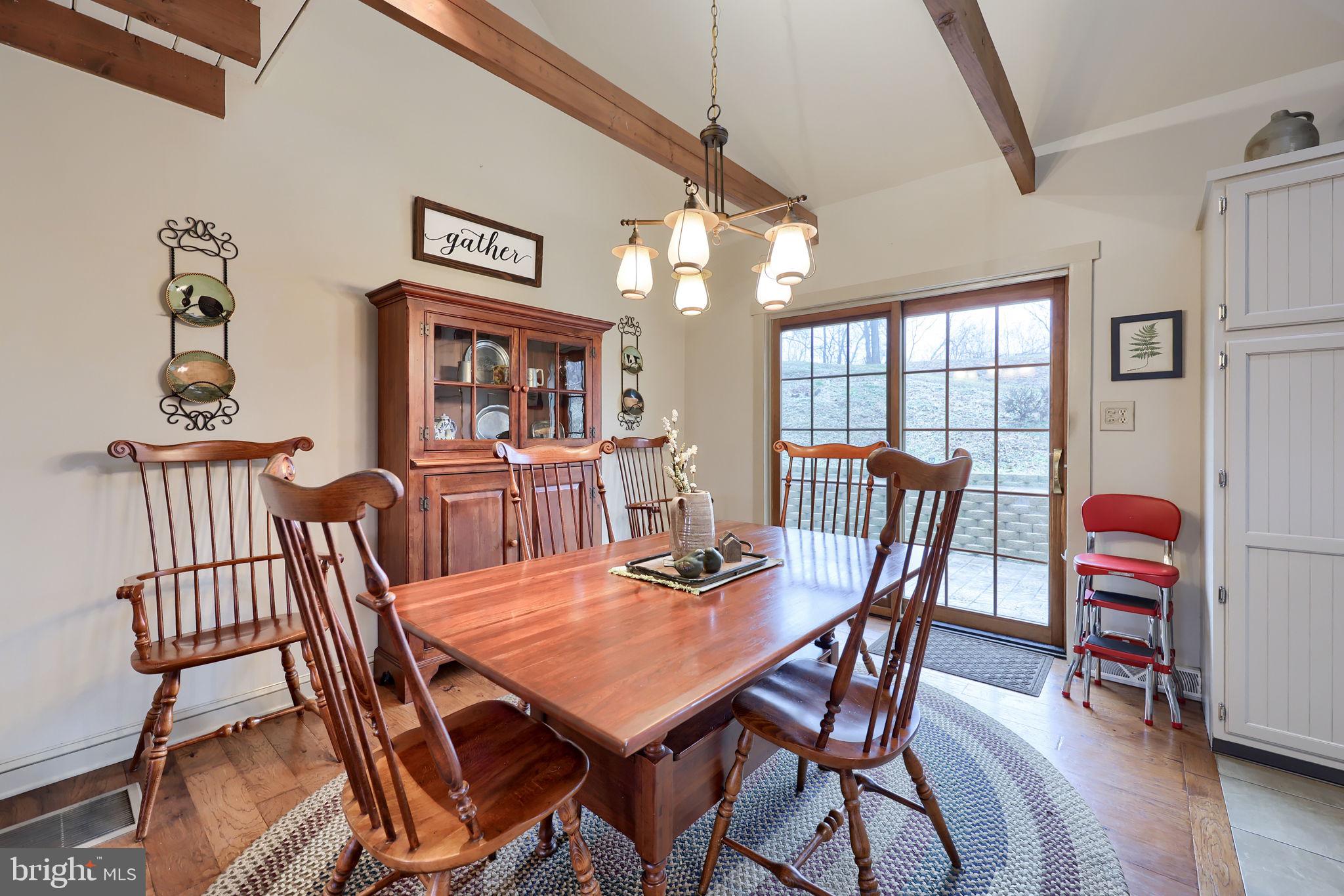 1521 West Penn Grant Road Lancaster, PA 17603 - Photo 13 of 67 a view of a dining room with furniture wooden floor and chandelier