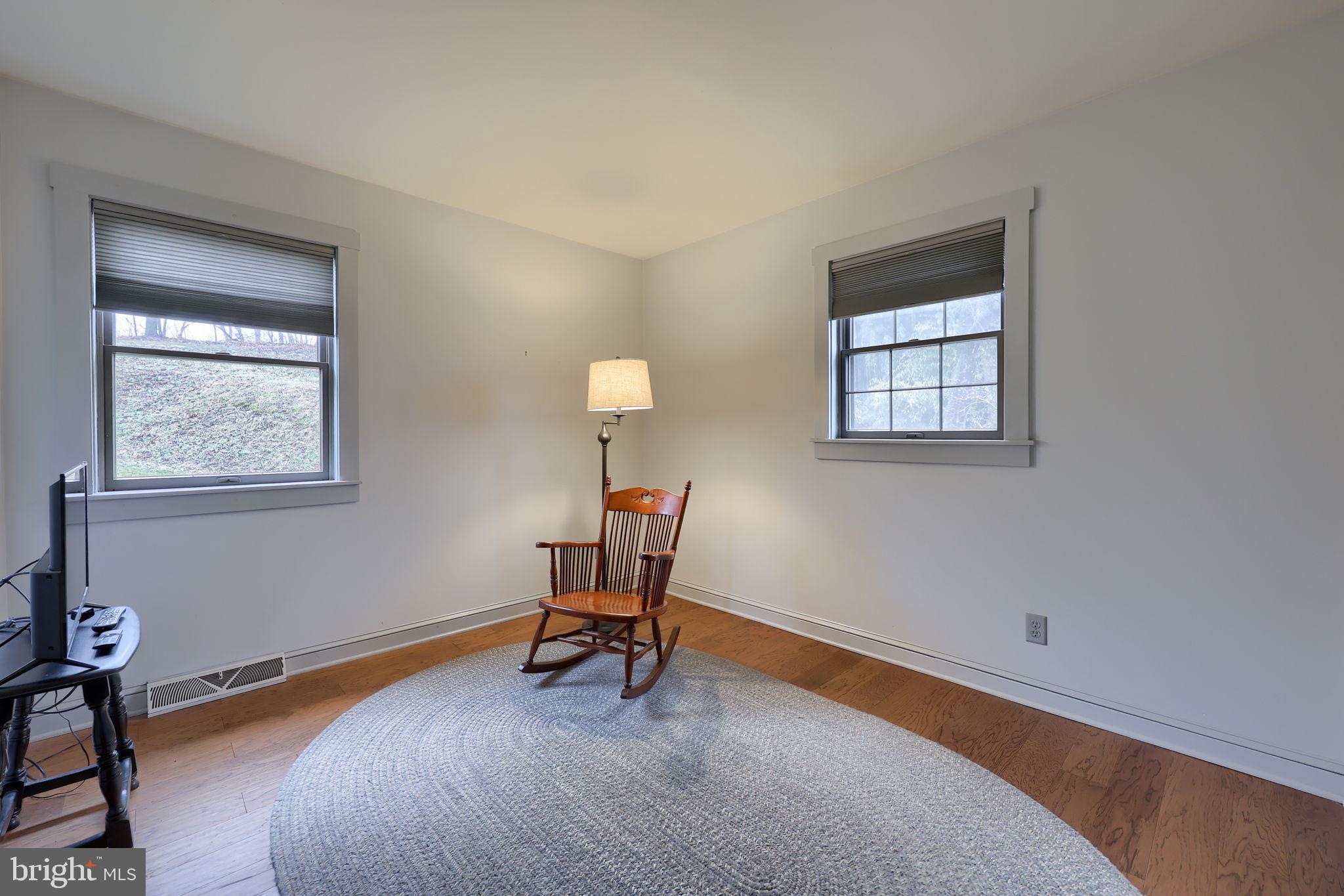 1521 West Penn Grant Road Lancaster, PA 17603 - Photo 18 of 67 a room with furniture and a window