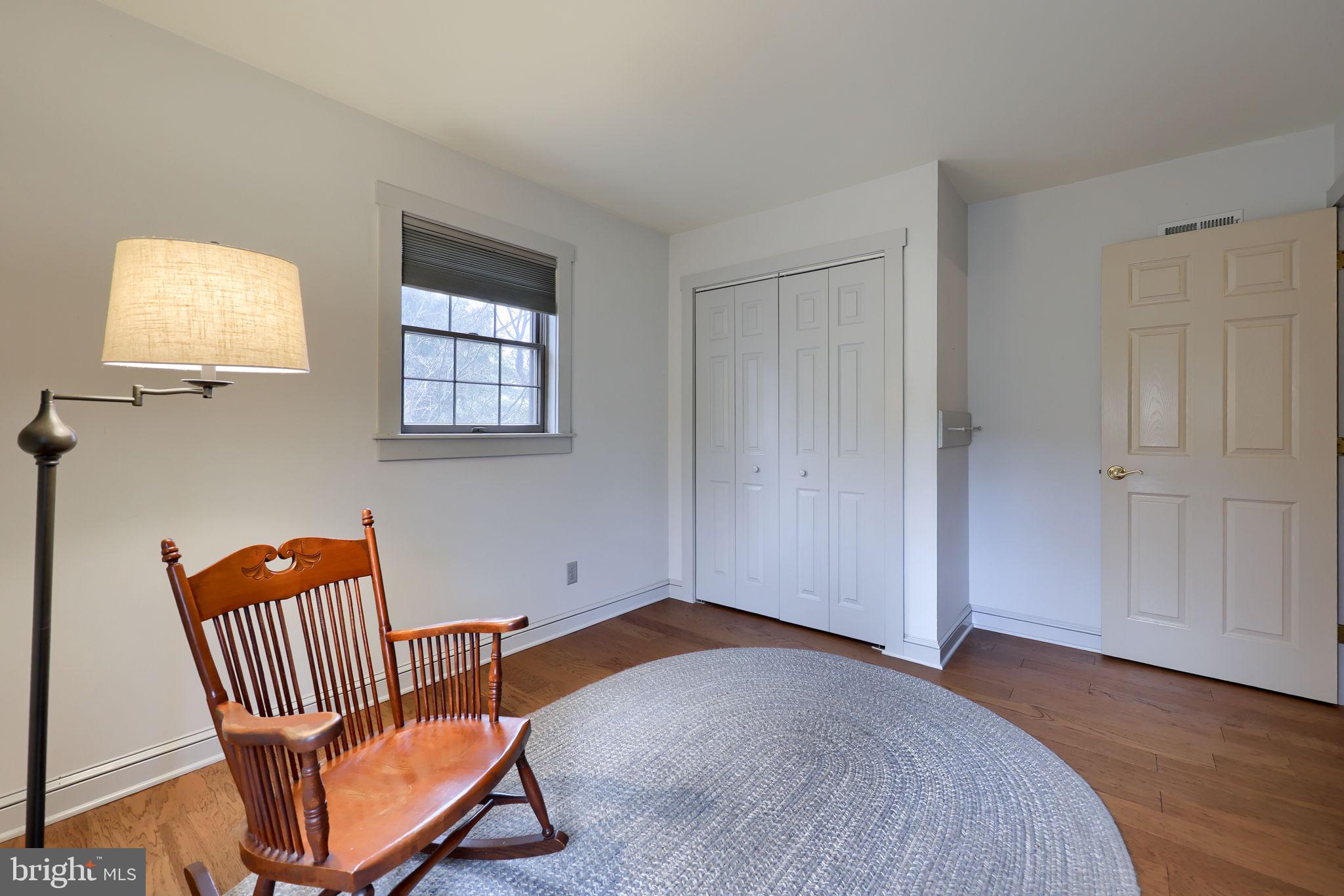 1521 West Penn Grant Road Lancaster, PA 17603 - Photo 19 of 67 a bedroom with a bed and wooden floor
