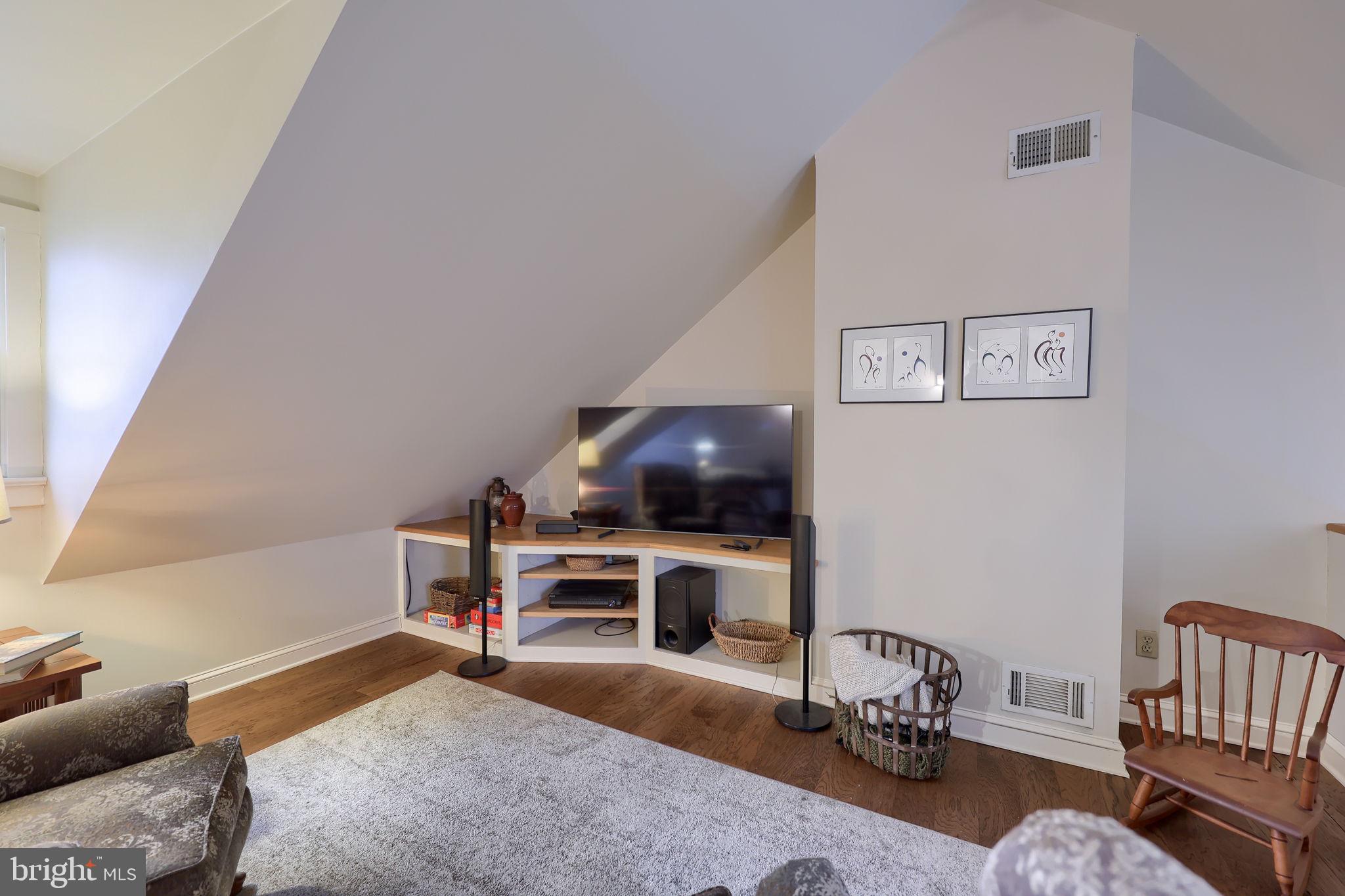 1521 West Penn Grant Road Lancaster, PA 17603 - Photo 28 of 67 a room with furniture and a wooden floor