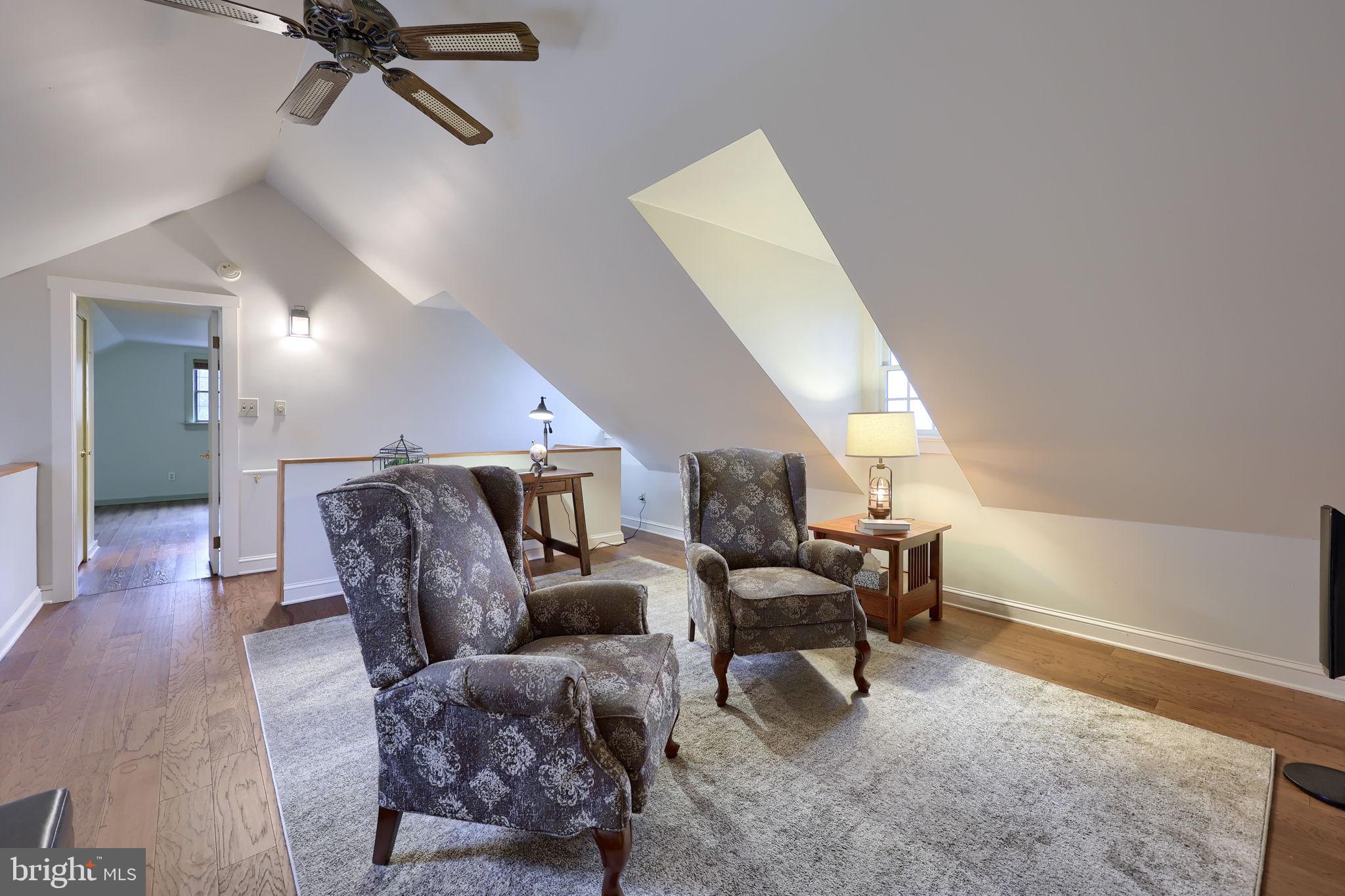 1521 West Penn Grant Road Lancaster, PA 17603 - Photo 29 of 67 a living room with furniture and a wooden floor