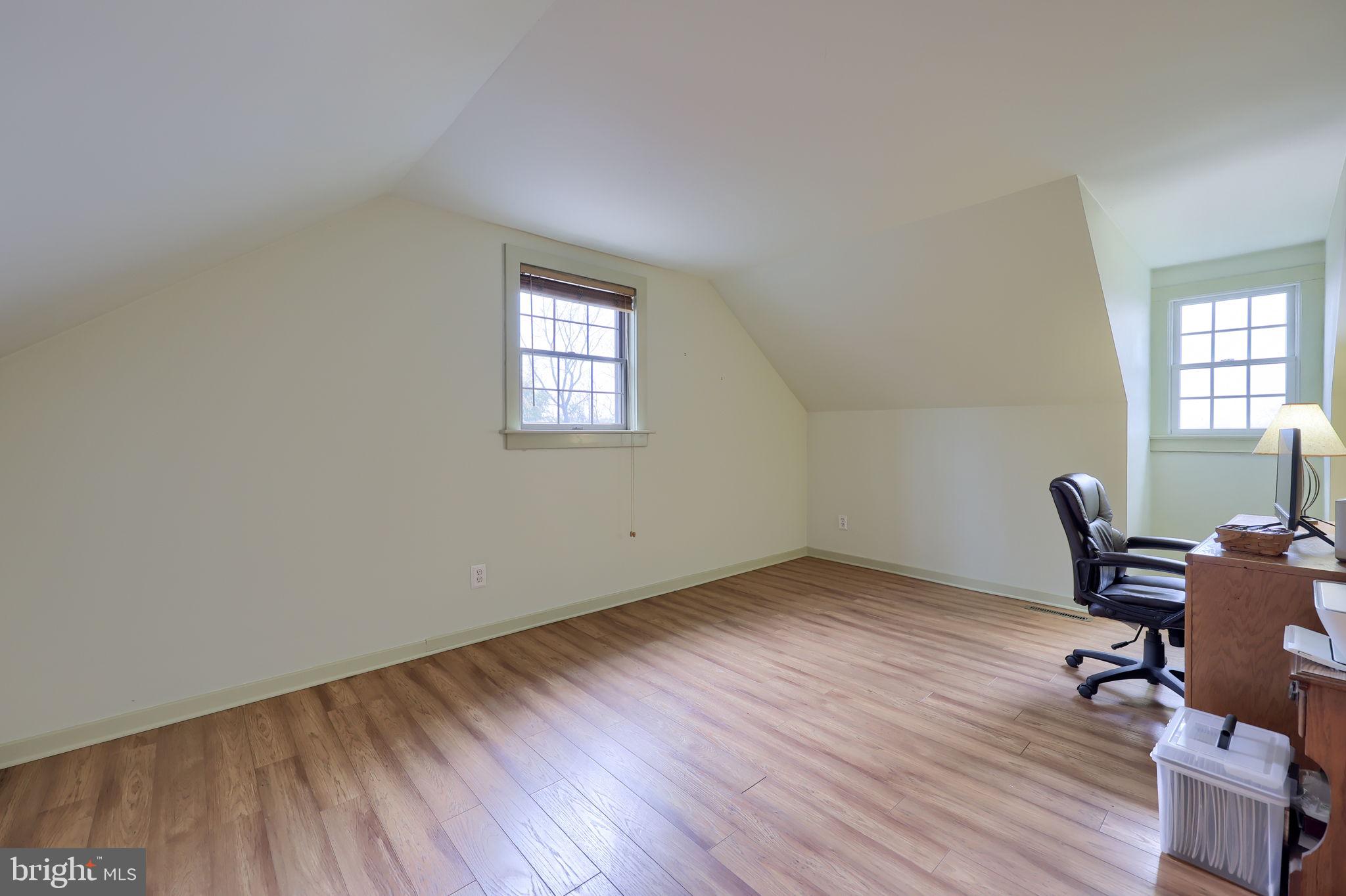 1521 West Penn Grant Road Lancaster, PA 17603 - Photo 33 of 67 a view of workspace with wooden floor and a window