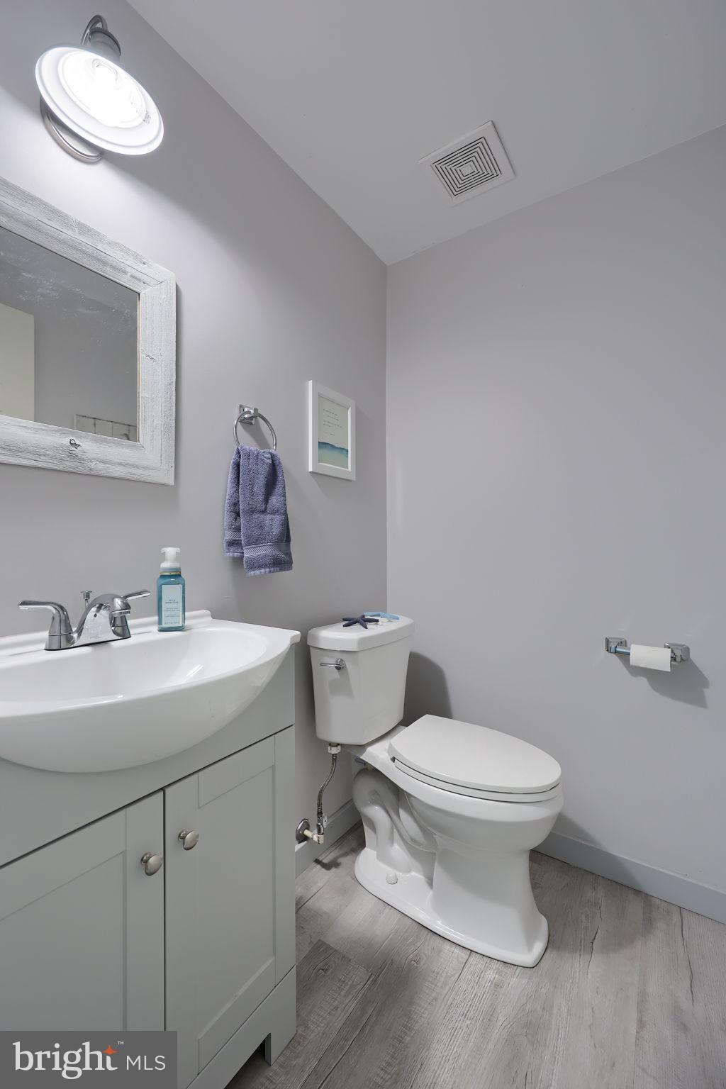 1521 West Penn Grant Road Lancaster, PA 17603 - Photo 36 of 67 a bathroom with a toilet sink and mirror