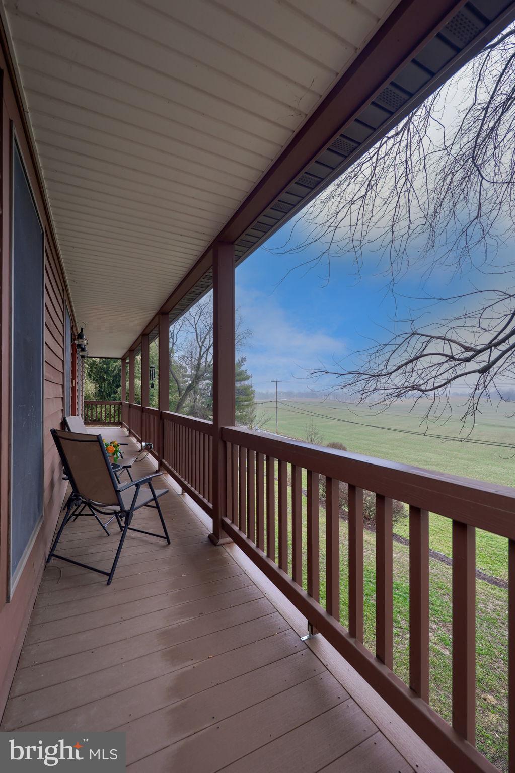 1521 West Penn Grant Road Lancaster, PA 17603 - Photo 39 of 67 a balcony with wooden floor outdoor seating and wooden floor