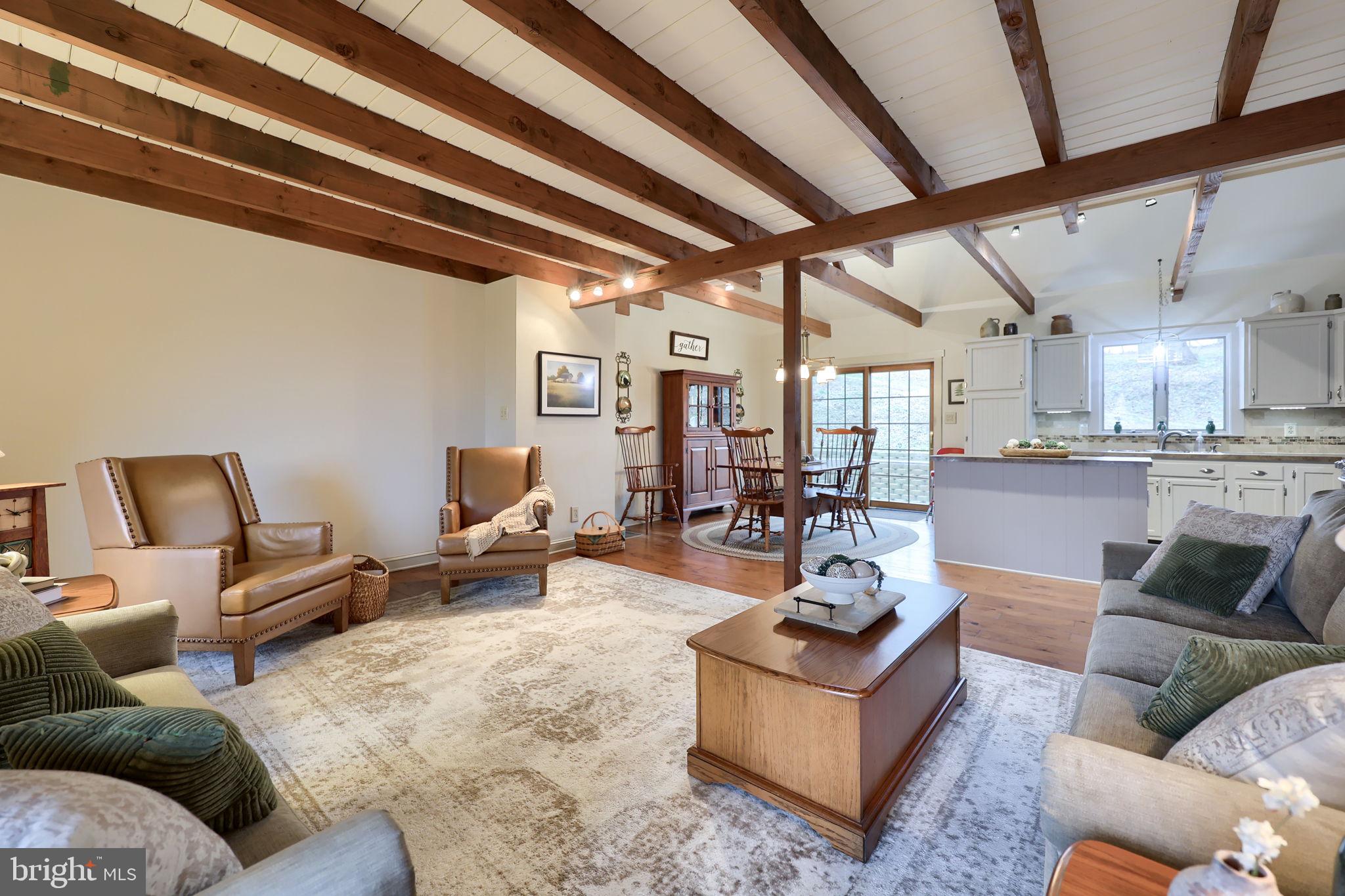 1521 West Penn Grant Road Lancaster, PA 17603 - Photo 4 of 67 a living room with furniture and kitchen view