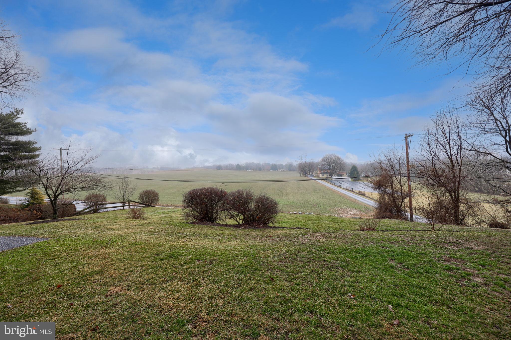 1521 West Penn Grant Road Lancaster, PA 17603 - Photo 43 of 67 a view of yard with swimming pool and green space