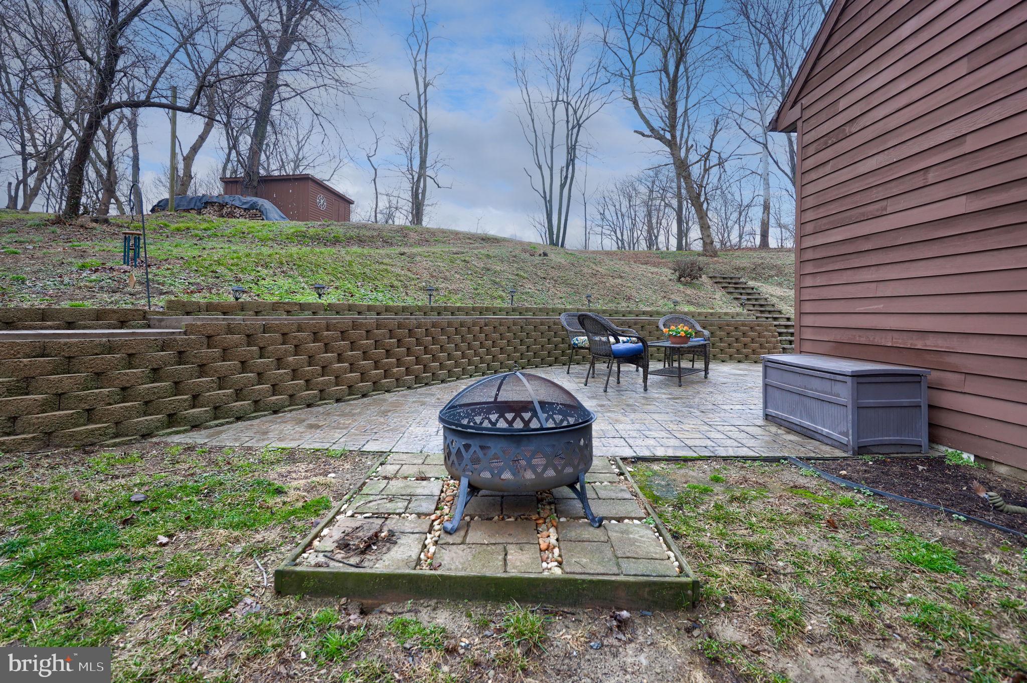 1521 West Penn Grant Road Lancaster, PA 17603 - Photo 47 of 67 a view of a chair and table in backyard