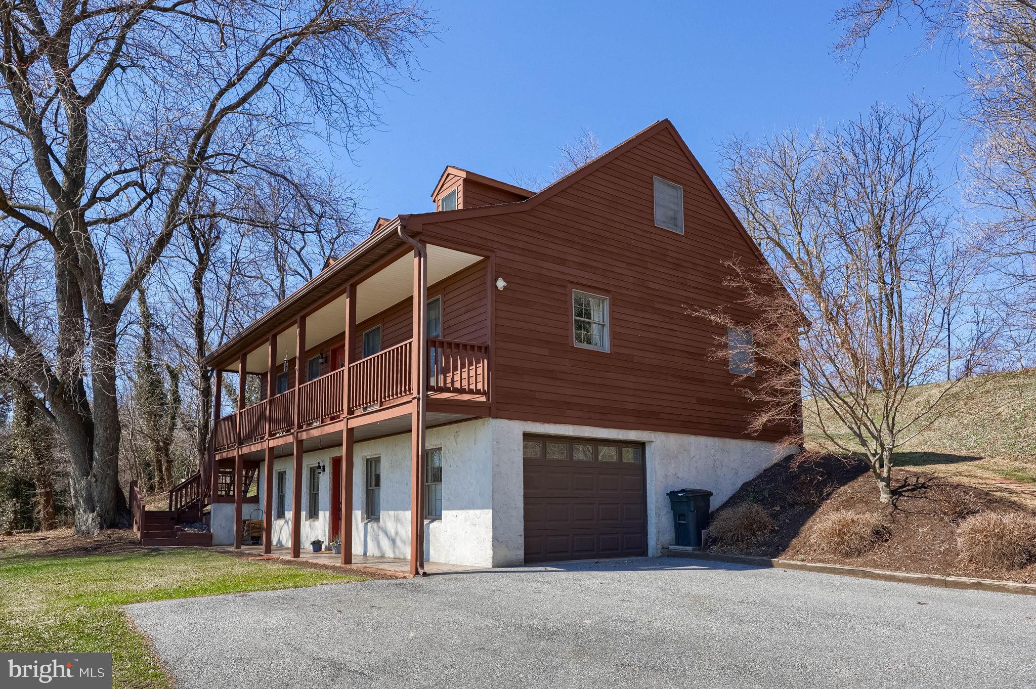 1521 West Penn Grant Road Lancaster, PA 17603 - Photo 54 of 67 a front view of house with yard and trees around