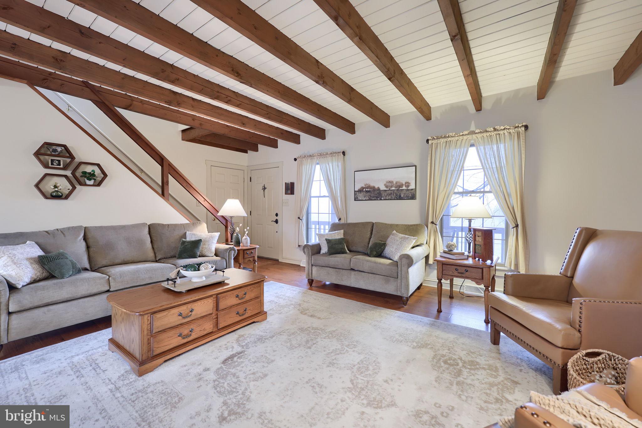 1521 West Penn Grant Road Lancaster, PA 17603 - Photo 6 of 67 a living room with furniture and a large window