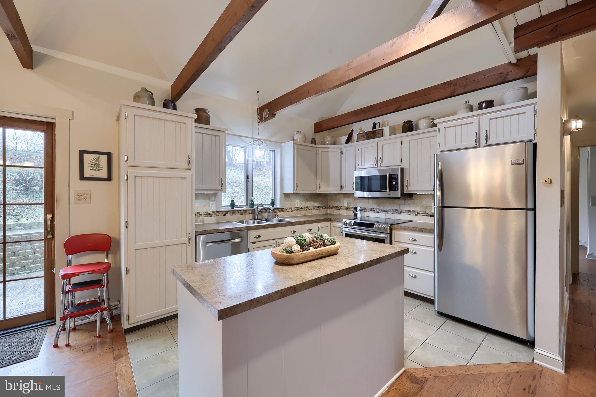 1521 West Penn Grant Road Lancaster, PA 17603 - Photo 8 of 67 a kitchen with stainless steel appliances granite countertop a refrigerator a stove a sink and a refrigerator