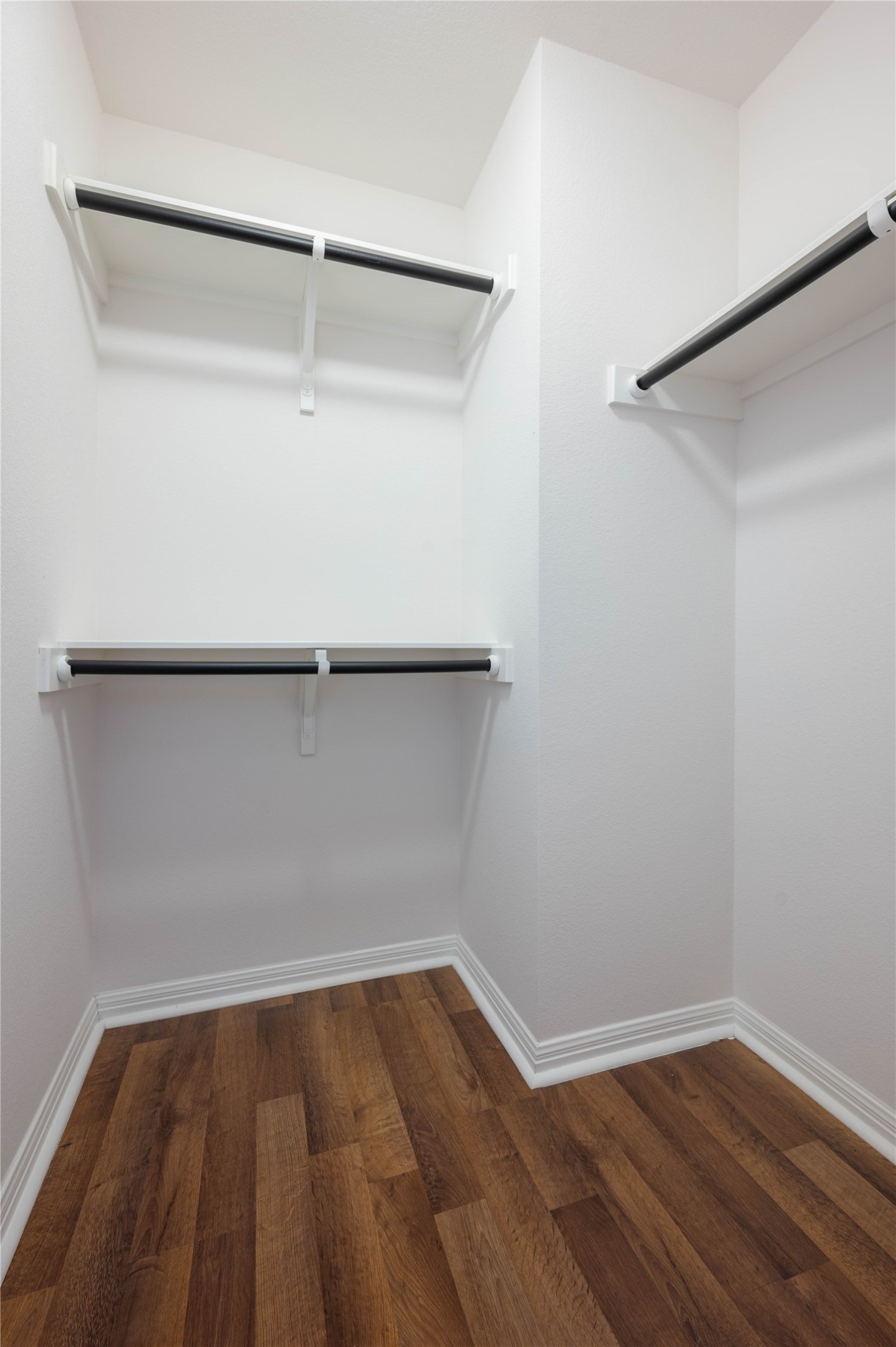 4514 Truth Way Austin, TX 78725 - Photo 17 of 20 Spacious closet with dark hardwood / wood-style floors