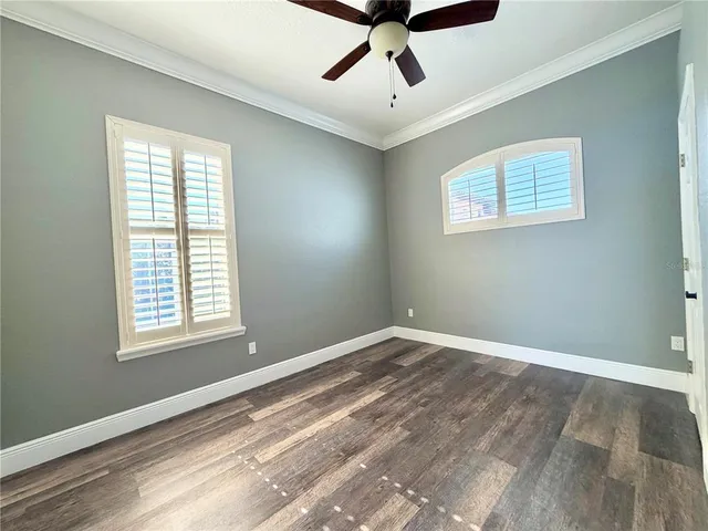 a bathroom with a granite countertop sink mirror and a