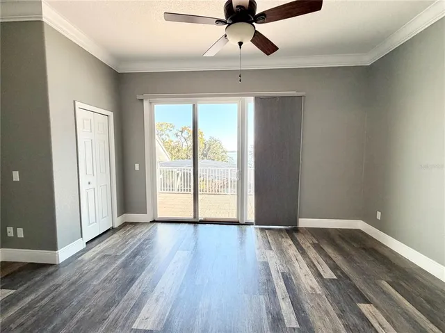 a view of balcony with wooden floor