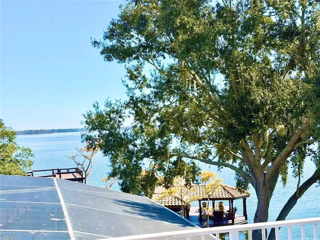 a view of swimming pool with outdoor seating