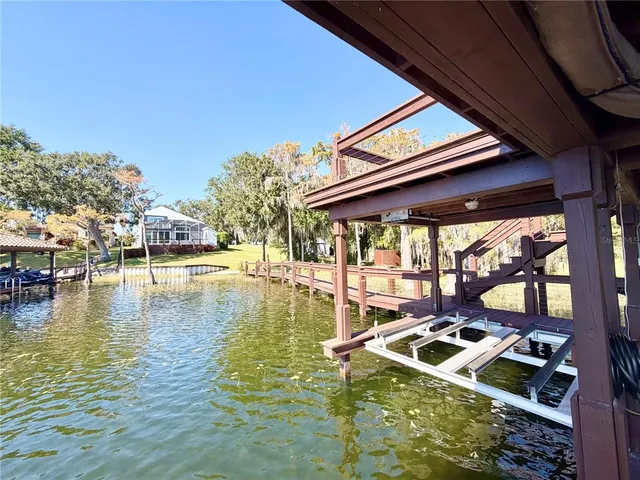 a view of swimming pool with outdoor seating
