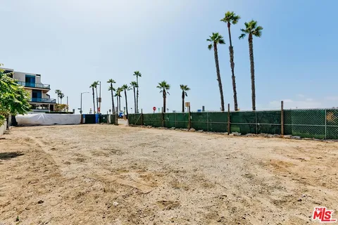 a view of a backyard of a house