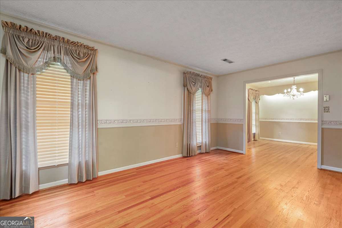 11302 Jefferson Road Athens, GA 30607 - Photo 11 of 75 a view of an empty room and window