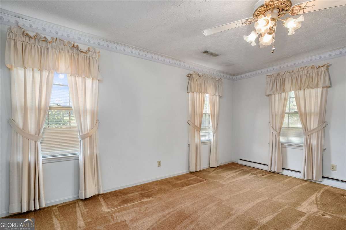 11302 Jefferson Road Athens, GA 30607 - Photo 16 of 75 a view of an empty room with a window