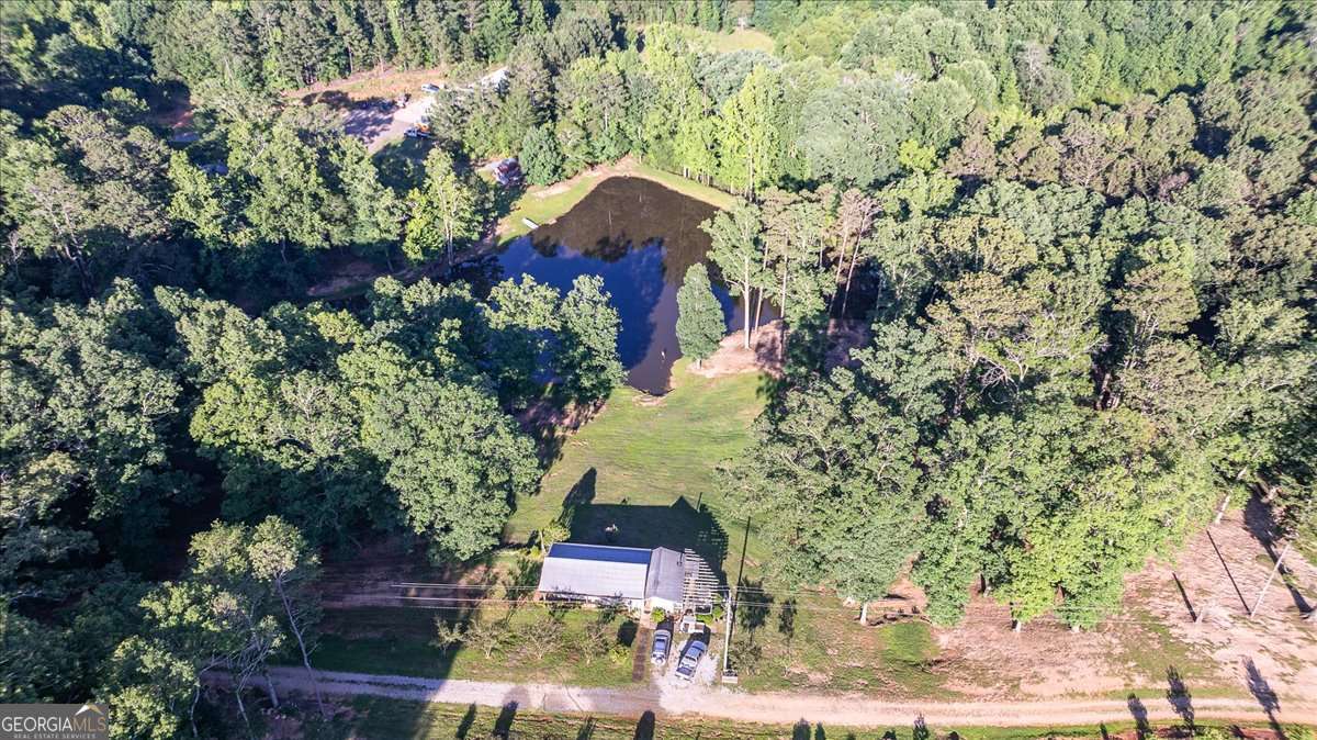 11302 Jefferson Road Athens, GA 30607 - Photo 75 of 75 an aerial view of a house with a yard and large trees
