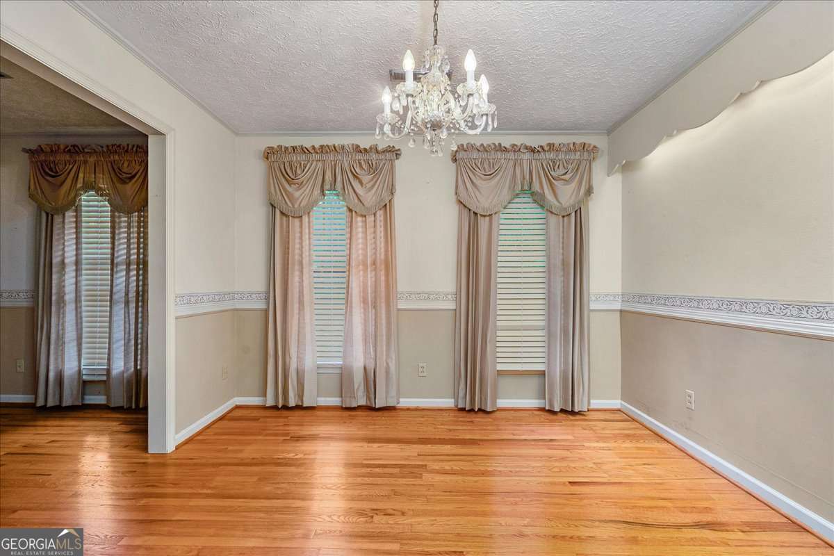 11302 Jefferson Road Athens, GA 30607 - Photo 9 of 75 a view of a chandelier in a room