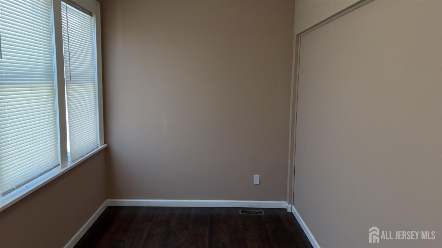 60 Heald Street, Unit F 1 Carteret, NJ 07008 - Photo 7 of 8 a view of small space with wooden floor