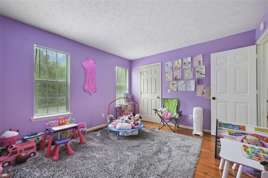 6420 Marbut Road Lithonia, GA 30058 - Photo 16 of 29 a living room with furniture and a window