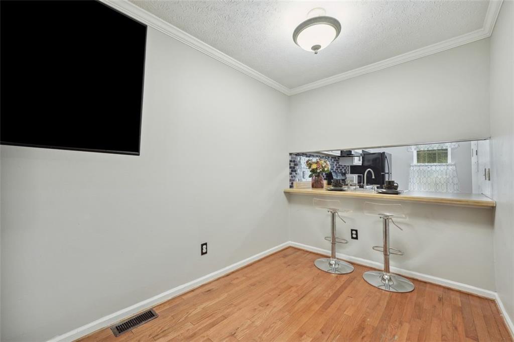 6420 Marbut Road Lithonia, GA 30058 - Photo 10 of 29 a view of small space with wooden floor