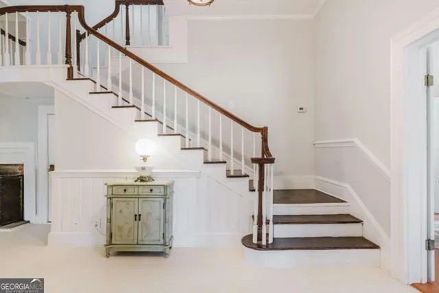 a view of entryway and hall with dining room