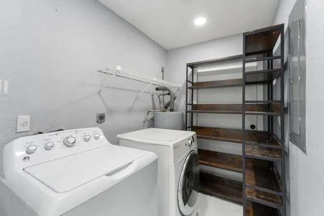 a utility room with dryer and washer