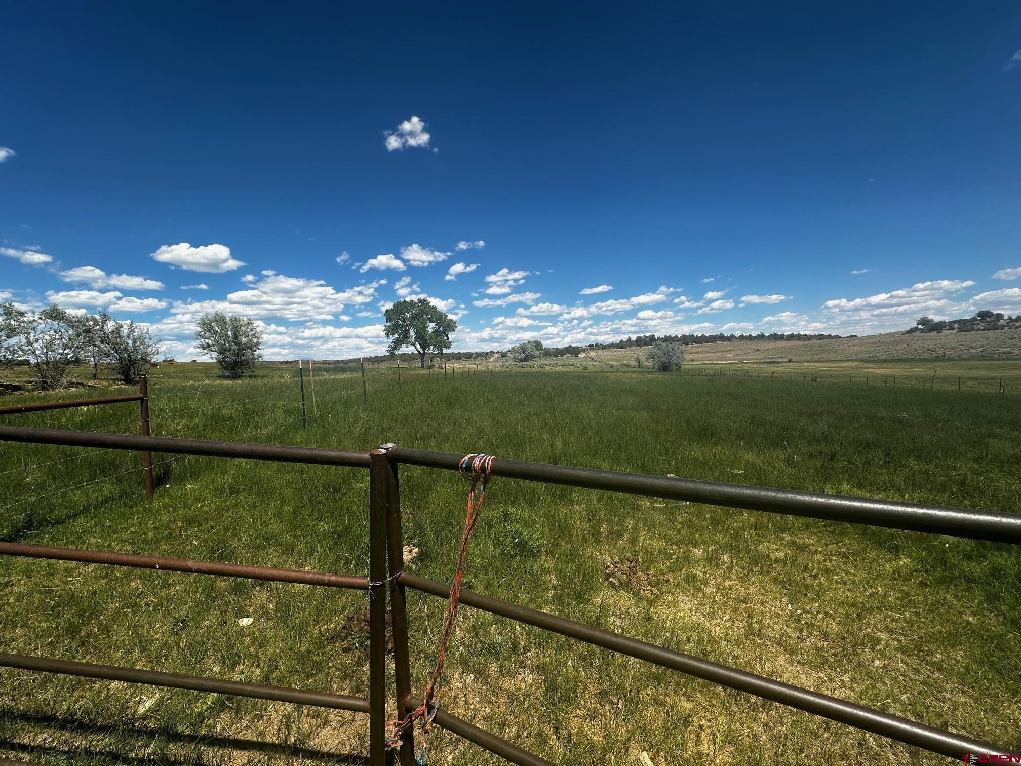 Tbd Road V 3 Lewis, CO 81327 - Photo 3 of 16 a view of a lake from a balcony
