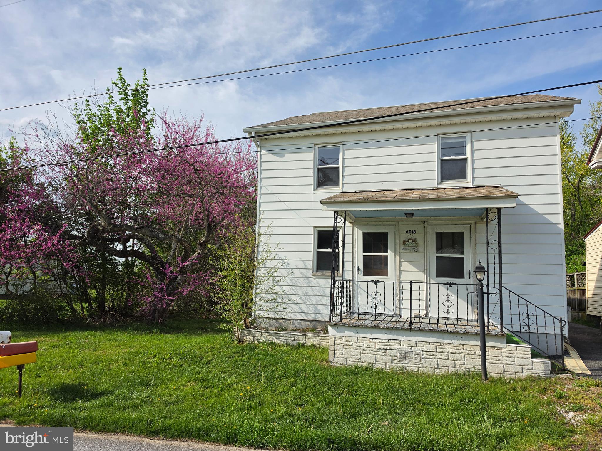 6018 Conover Road Taneytown, MD 21787 - Photo 1 of 18 a front view of a house with a yard
